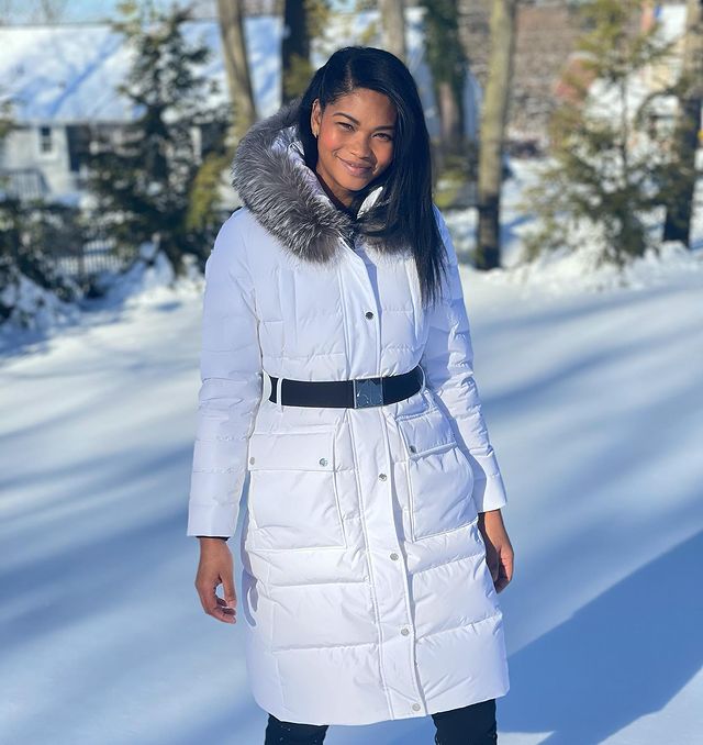 Chanel iman wearing white snow jacket