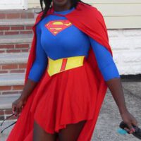 Dark skin cutey as superwoman