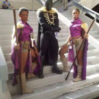 Dora milaje with black panther on stairs