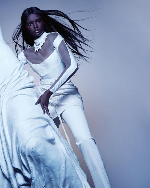 Duckie thot modeling all white outfit