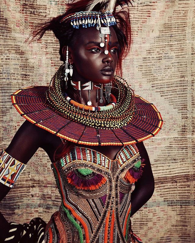 Duckie thot wearing african clothes