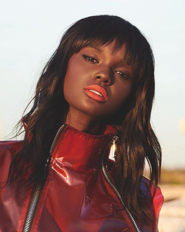 Duckie thot wearing red jacket