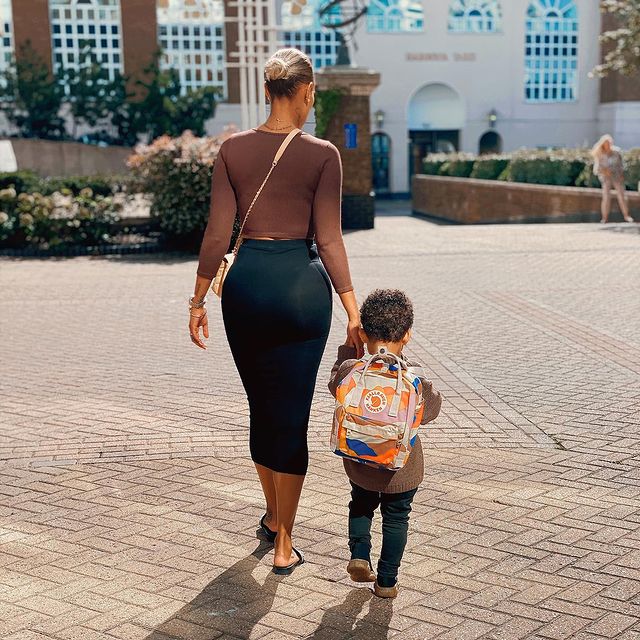 Fanny neguesha walking with her son