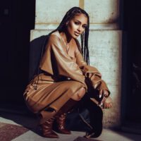 Fanny neguesha wearing leather brown outfit