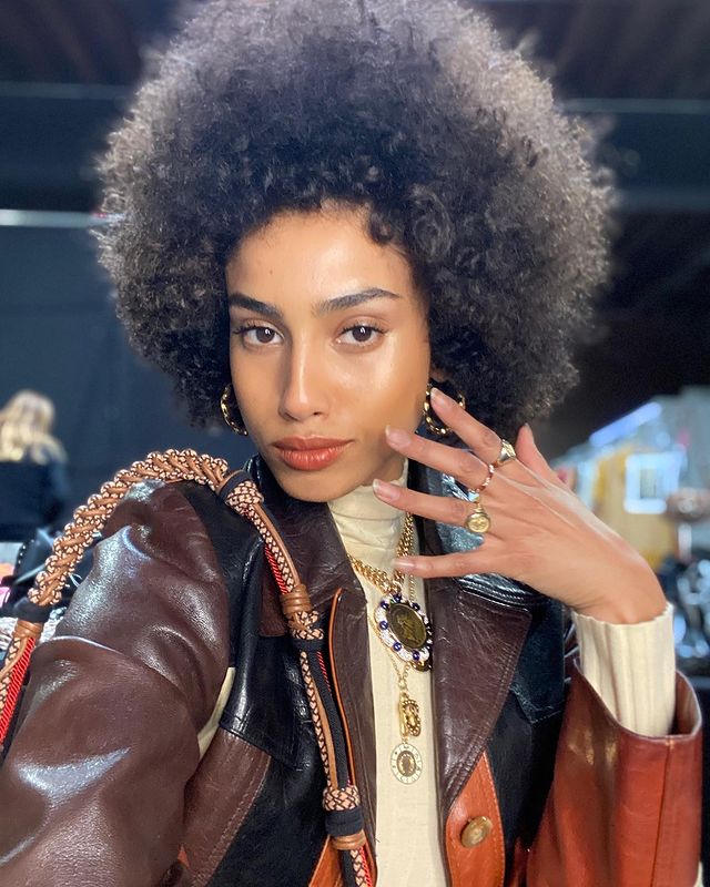 Imaan hammam with afro