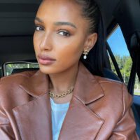 Jasmine tookes with brown leather jacket