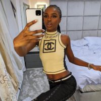 Leomie anderson wearing chanel shirt