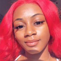 Younger Sha Carri Richardson With Red Hair