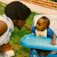 Dina Asher Smith as a baby with her mother