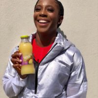 Shelly Ann Fraser Pryce drinking tropical juice