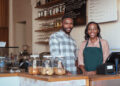 Black business owners smiling
