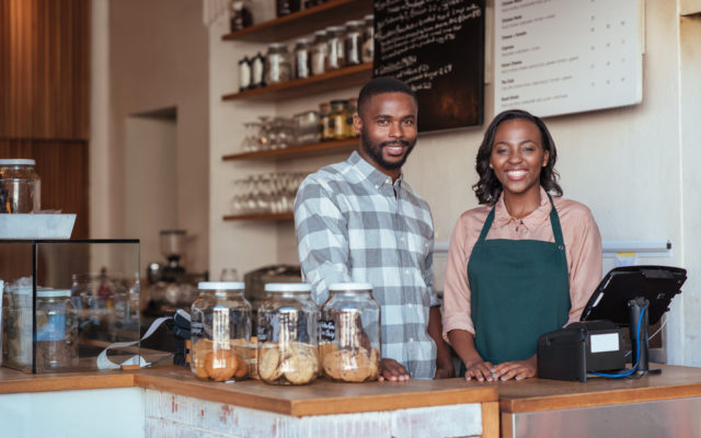 Black business owners smiling