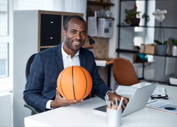 Black Man Business Holding Basketball