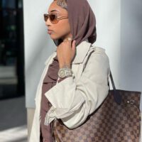Black Girl With Watch Wearing Hijab