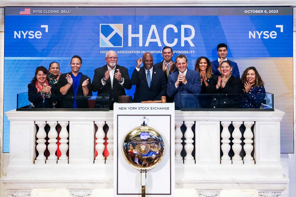 HACR staff and board members on the dais of the New York Stock Exchange on Friday, Oct. 6, 2023 during the closing ceremony.
