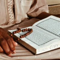 Black Man Reading Quran